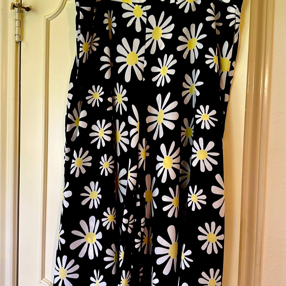Palazzo pants and matching top,with the matching purse. Size clip pants,top xlp